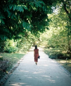 person standing alone looking lost and confused about direction in life