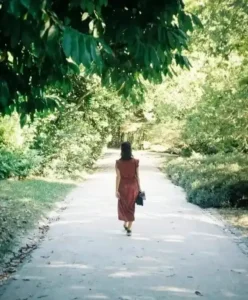 person standing alone looking lost and confused about direction in life