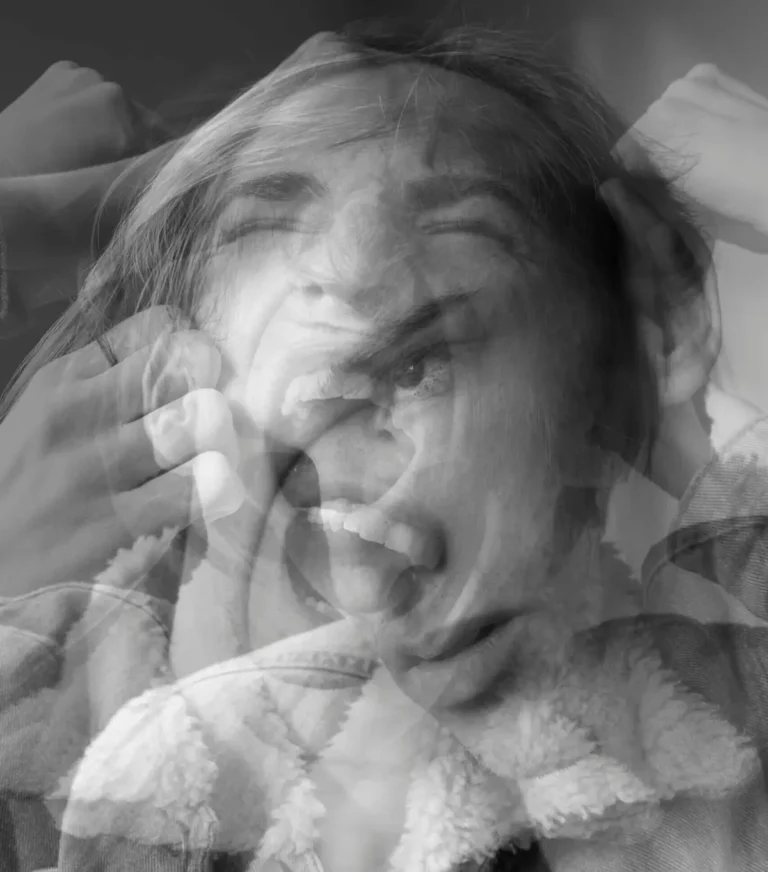 person experiencing intense emotional overwhelm and subconscious triggers
